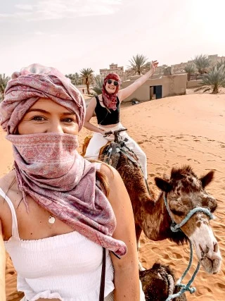 Camel trekking in sahara desert merzouga