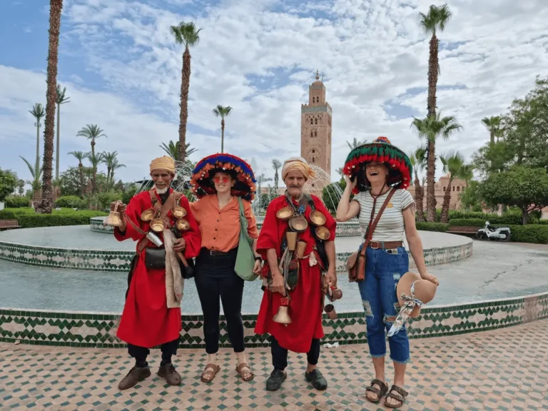Best Marrakech Tours with local water sellers near Koutoubia Mosque in Marrakech